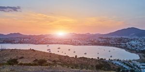 Panoramic Sunset view of Gumbet bay in Bodrum on Turkish Riviera. Bodrum is a district and a port city in Mugla Province, in the southwestern Aegean Region of Turkey
